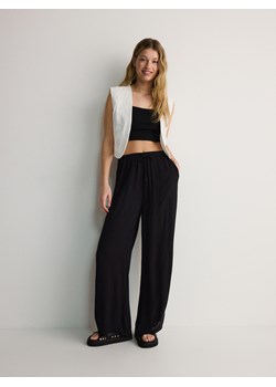 Reserved - Spodnie z wiskozy - czarny ze sklepu Reserved w kategorii Spodnie damskie - zdjęcie 172599620