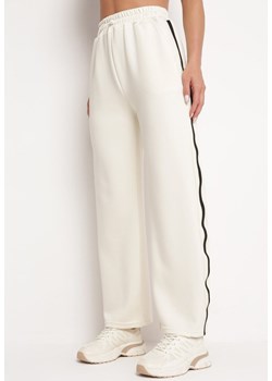 Jasnobeżowe Szerokie Spodnie z Wysokim Stanem z Gumką w Pasie i Lampasami Xerolia ze sklepu Born2be Odzież w kategorii Spodnie damskie - zdjęcie 172635420