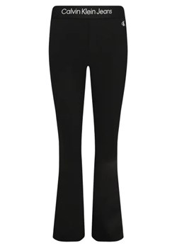CALVIN KLEIN JEANS Spodnie PUNTO TAPE FLARE | flare fit ze sklepu Gomez Fashion Store w kategorii Spodnie dziewczęce - zdjęcie 172712623