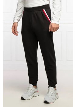 Tommy Hilfiger Spodnie dresowe | Regular Fit ze sklepu Gomez Fashion Store w kategorii Spodnie męskie - zdjęcie 172938511