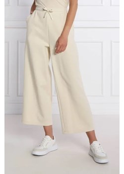 Calvin Klein Spodnie dresowe | flare fit ze sklepu Gomez Fashion Store w kategorii Spodnie damskie - zdjęcie 172941411