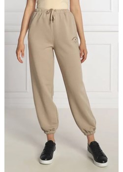 Tommy Sport Spodnie dresowe | Relaxed fit ze sklepu Gomez Fashion Store w kategorii Spodnie damskie - zdjęcie 172941470