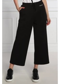 Calvin Klein Spodnie dresowe | flare fit ze sklepu Gomez Fashion Store w kategorii Spodnie damskie - zdjęcie 172941534
