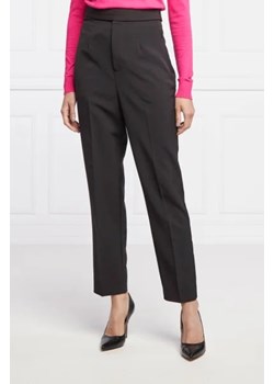 GUESS Spodnie MARTINA | Regular Fit ze sklepu Gomez Fashion Store w kategorii Spodnie damskie - zdjęcie 172945353
