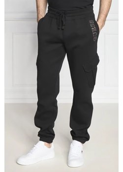 GUESS Spodnie dresowe VIL | Regular Fit ze sklepu Gomez Fashion Store w kategorii Spodnie męskie - zdjęcie 172964253