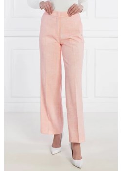 GUESS Spodnie ELIANE | flare fit ze sklepu Gomez Fashion Store w kategorii Spodnie damskie - zdjęcie 172970280