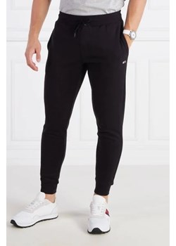 Tommy Jeans Spodnie dresowe TJM SLIM FLEECE SWEA | Slim Fit ze sklepu Gomez Fashion Store w kategorii Spodnie męskie - zdjęcie 172970513