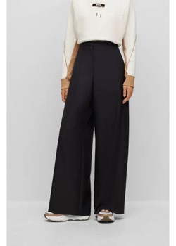 BOSS BLACK Wełniane spodnie Tilwida Alica | flare fit ze sklepu Gomez Fashion Store w kategorii Spodnie damskie - zdjęcie 172971531