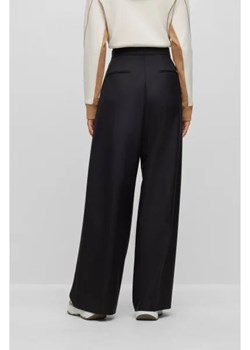 BOSS BLACK Wełniane spodnie Tilwida Alica | flare fit ze sklepu Gomez Fashion Store w kategorii Spodnie damskie - zdjęcie 172971532