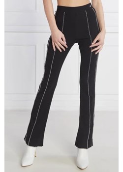 Tommy Jeans Spodnie SEAM DETAIL | flare fit ze sklepu Gomez Fashion Store w kategorii Spodnie damskie - zdjęcie 172985324