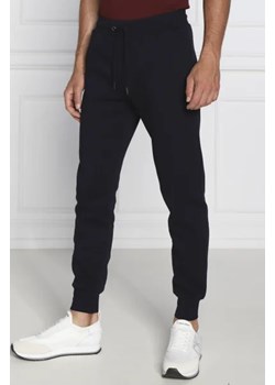 Tommy Hilfiger Spodnie dresowe | Regular Fit ze sklepu Gomez Fashion Store w kategorii Spodnie męskie - zdjęcie 172987563