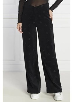 HUGO Spodnie dresowe Navalia | flare fit ze sklepu Gomez Fashion Store w kategorii Spodnie damskie - zdjęcie 172988962