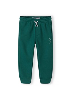 Zielone dresowe spodnie regular chłopięce ze sklepu 5.10.15 w kategorii Spodnie chłopięce - zdjęcie 173013352