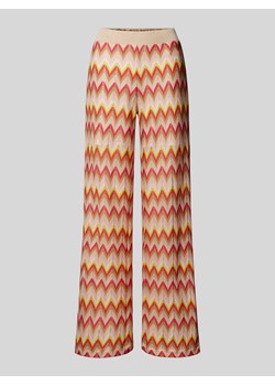 Spodnie materiałowe z szerokimi nogawkami i wzorem w zygzaki ze sklepu Peek&Cloppenburg  w kategorii Spodnie damskie - zdjęcie 173124161