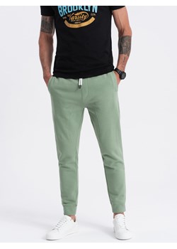 Spodnie męskie dresowe typu jogger - zielone V3 OM-PABS-0173 ze sklepu ombre w kategorii Spodnie męskie - zdjęcie 173125430