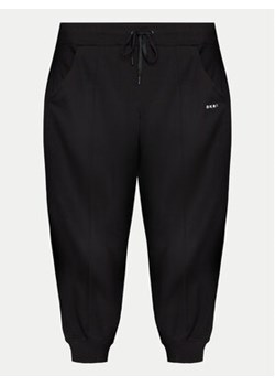 DKNY Sport Spodnie dresowe DPPP2513 Czarny Regular Fit ze sklepu MODIVO w kategorii Spodnie damskie - zdjęcie 173138732