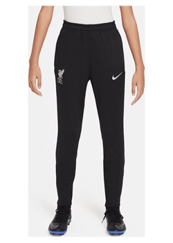 Dzianinowe spodnie piłkarskie dla dużych dzieci Nike Dri-FIT Liverpool F.C. Strike - Czerń ze sklepu Nike poland w kategorii Spodnie chłopięce - zdjęcie 173289370