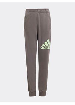 adidas Spodnie dresowe w kolorze khaki ze sklepu Limango Polska w kategorii Spodnie chłopięce - zdjęcie 173292021