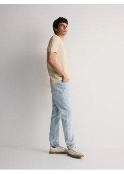Reserved - Jeansy slim fit z przetarciami - niebieski ze sklepu Reserved w kategorii Jeansy męskie - zdjęcie 173335531