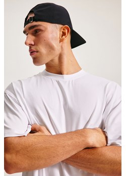 H & M - Luźny top sportowy DryMove Loose Fit - Biały ze sklepu H&M w kategorii T-shirty męskie - zdjęcie 173372324