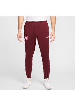 Męskie spodnie piłkarskie Polska Strike Nike Dri-FIT - Czerwony ze sklepu Nike poland w kategorii Spodnie męskie - zdjęcie 173376900