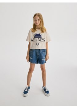 Reserved - Jeansowe szorty z przetarciami - niebieski ze sklepu Reserved w kategorii Spodenki dziewczęce - zdjęcie 173380712