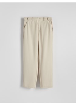 Reserved - Dzianinowe spodnie wide leg - kremowy ze sklepu Reserved w kategorii Spodnie męskie - zdjęcie 173389804