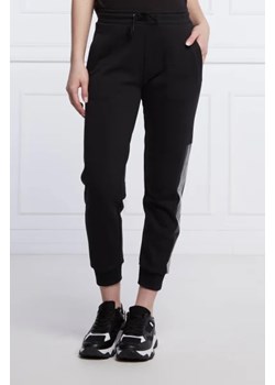 CALVIN KLEIN JEANS Spodnie dresowe | Regular Fit ze sklepu Gomez Fashion Store w kategorii Spodnie damskie - zdjęcie 173437464