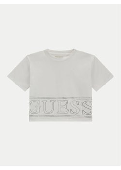 Guess T-Shirt J4YI17 K6YW4 Biały Boxy Fit ze sklepu MODIVO w kategorii Bluzki dziewczęce - zdjęcie 173438151