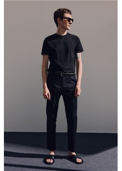 H & M - Bawełniane spodnie Slim Fit - Czarny ze sklepu H&M w kategorii Spodnie męskie - zdjęcie 173452910