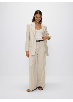 Reserved - Spodnie z domieszką wiskozy i lnu - beżowy ze sklepu Reserved w kategorii Spodnie damskie - zdjęcie 173457344