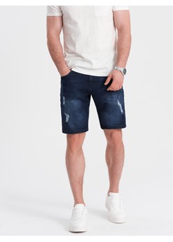 Krótkie spodenki męskie jeansowe z dziurami – ciemnoniebieskie V3 OM-SRDS-0146 ze sklepu ombre w kategorii Spodenki męskie - zdjęcie 173474624