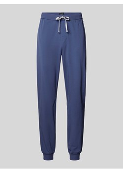 Spodnie dresowe z elastycznym pasem model ‘Hadiko’ ze sklepu Peek&Cloppenburg  w kategorii Spodnie męskie - zdjęcie 173556531