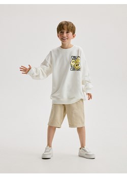 Reserved - Bluza ovesize SmileyWorld® - złamana biel ze sklepu Reserved w kategorii Bluzy chłopięce - zdjęcie 173564091