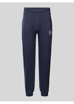 Spodnie dresowe z elastycznym pasem model ‘SPRAY’ ze sklepu Peek&Cloppenburg  w kategorii Spodnie męskie - zdjęcie 173569351