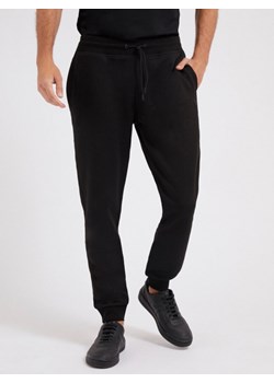 Męskie spodnie dresowe GUESS ALDWIN LONG PANT ze sklepu Sportstylestory.com w kategorii Spodnie męskie - zdjęcie 173577383