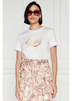 GUESS T-shirt GLITTERY LOGO | Regular Fit ze sklepu Gomez Fashion Store w kategorii Bluzki damskie - zdjęcie 173579414