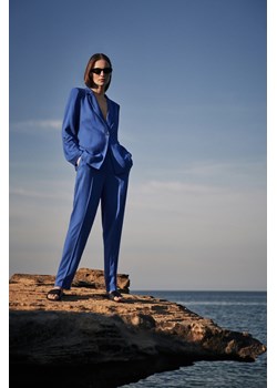 Lniane spodnie z nogawkami w kant niebieskie ze sklepu Moodo.pl w kategorii Spodnie damskie - zdjęcie 173583502