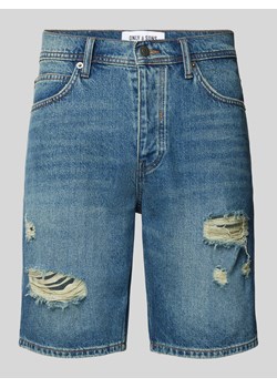 Szorty jeansowe o kroju regular fit z przetarciami model ‘EDGE’ ze sklepu Peek&Cloppenburg  w kategorii Spodenki męskie - zdjęcie 173583893