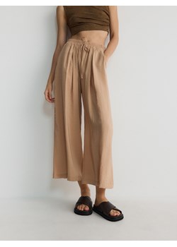 Reserved - Spodnie culotte z modalu - brzoskwiniowy ze sklepu Reserved w kategorii Spodnie damskie - zdjęcie 173589994