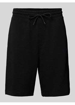 Szorty z dzianiny dresowej o kroju regular fit z detalem z logo model ‘Nasensio’ ze sklepu Peek&Cloppenburg  w kategorii Spodenki męskie - zdjęcie 173611622