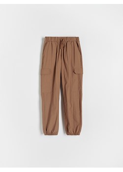 Reserved - Spodnie parachute z łączonych materiałów - brązowy ze sklepu Reserved w kategorii Spodnie chłopięce - zdjęcie 173659402