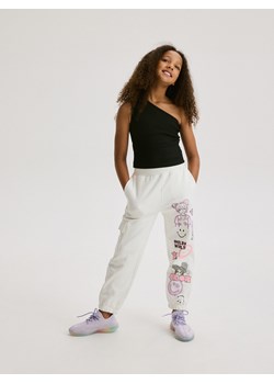 Reserved - Spodnie dresowe SmileyWorld® - złamana biel ze sklepu Reserved w kategorii Spodnie dziewczęce - zdjęcie 173659582