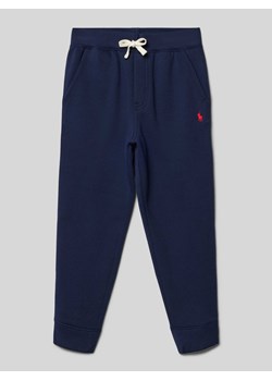 Spodnie dresowe o kroju regular fit z wpuszczanymi kieszeniami ze sklepu Peek&Cloppenburg  w kategorii Spodnie chłopięce - zdjęcie 173662273