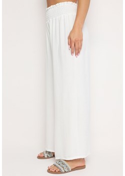 Białe Szerokie Spodnie z Wysokim Stanem Wykończone Gumką w Pasie Risinassa ze sklepu Born2be Odzież w kategorii Spodnie damskie - zdjęcie 173684093