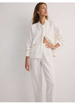 Reserved - Spodnie z kantem - złamana biel ze sklepu Reserved w kategorii Spodnie damskie - zdjęcie 173694640