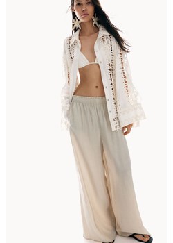 H & M - Szerokie kreszowane spodnie - Beżowy ze sklepu H&M w kategorii Spodnie damskie - zdjęcie 173722251