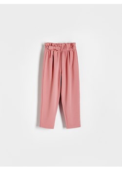 Reserved - Dzianinowe spodnie z kokardką - brudny róż ze sklepu Reserved w kategorii Spodnie i półśpiochy - zdjęcie 173737220