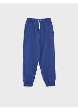 Sinsay - Spodnie dresowe jogger - niebieski ze sklepu Sinsay w kategorii Spodnie chłopięce - zdjęcie 173743094