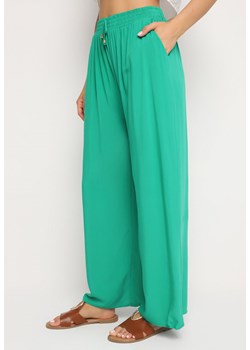 Zielone  Gładkie Spodnie z Gumką w Pasie i Szerokimi Nogawkami Alathera ze sklepu Born2be Odzież w kategorii Spodnie damskie - zdjęcie 173752442